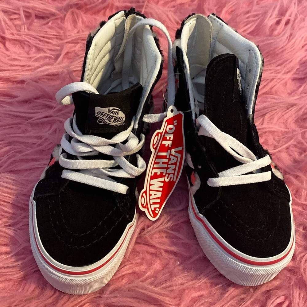 Kids never been worn Vans size 11
